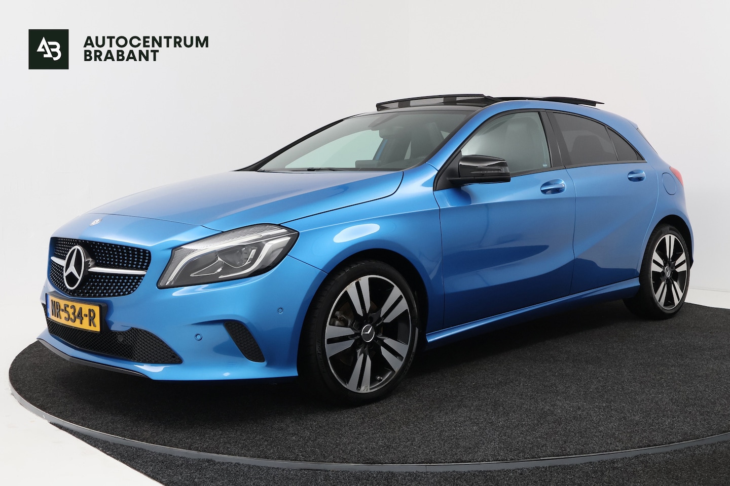 Mercedes-Benz A-klasse - 160 Ambition Automaat (PANORAMADAK, NAVIGATIE, LED. MULTIMEDIA, STUURBEDIENING, CRUISE) - AutoWereld.nl