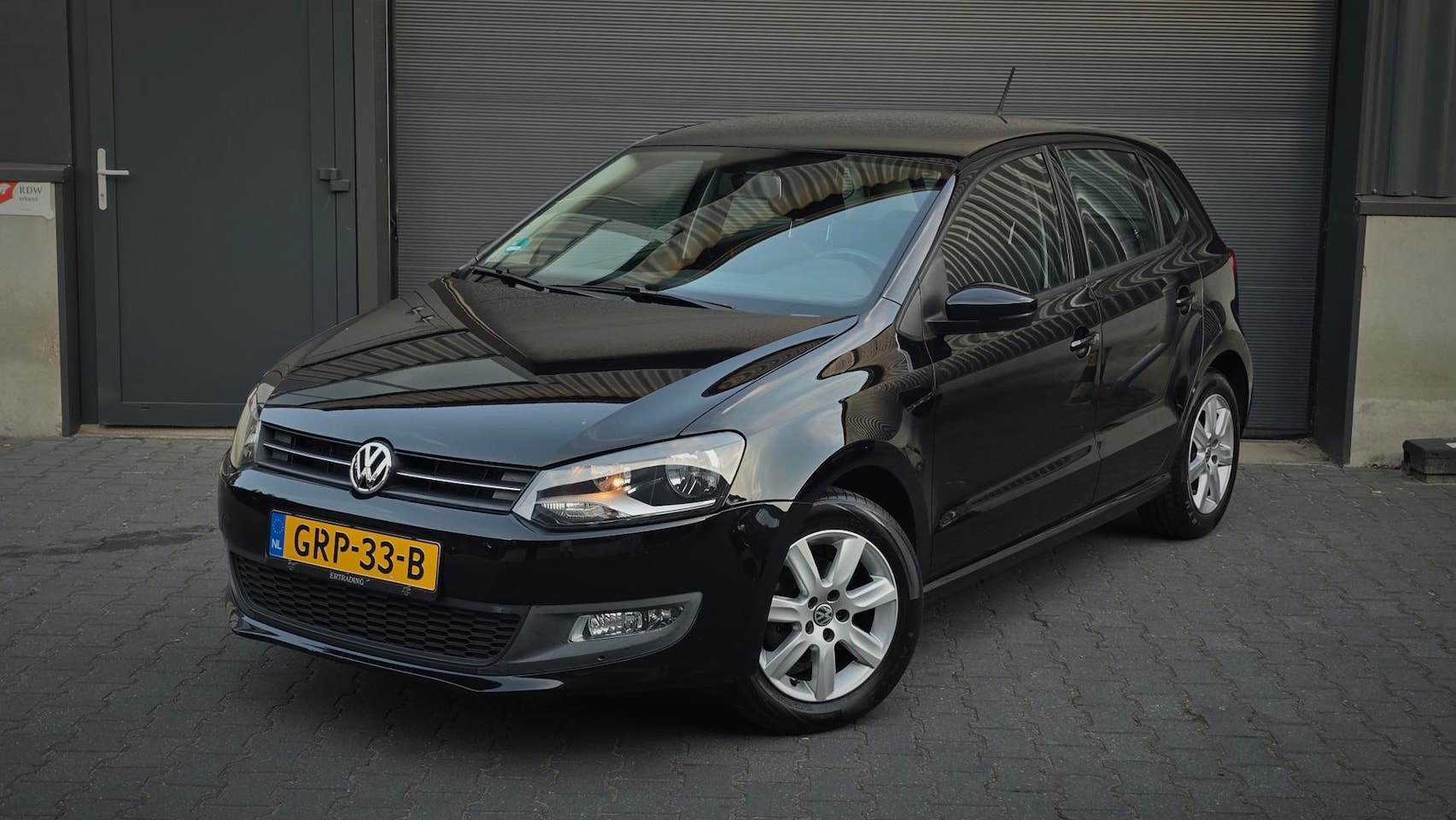 Volkswagen Polo - 1.4-16V High Airco Carplay Lichtmet. velgen - AutoWereld.nl
