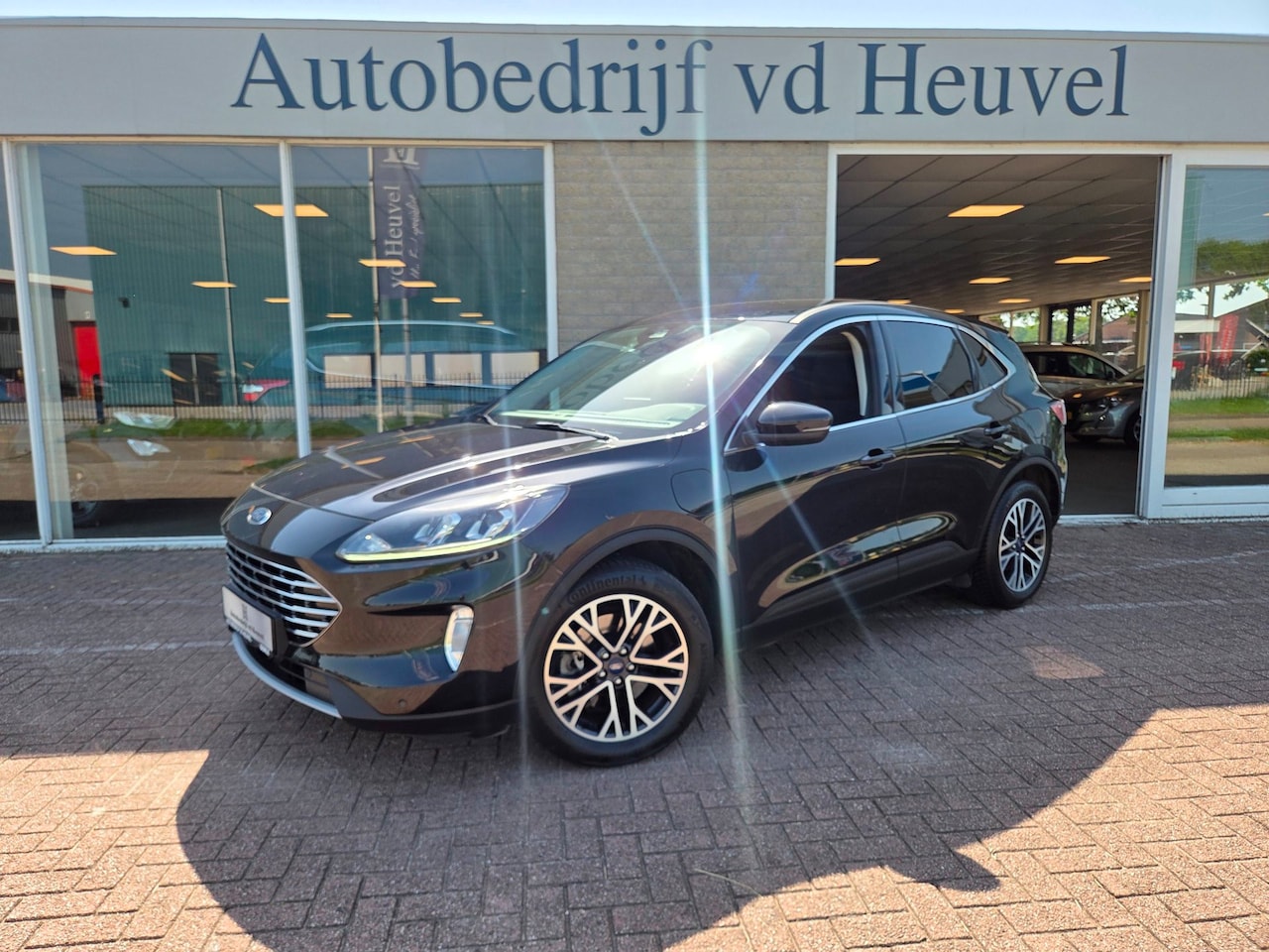 Ford Kuga - 2.5 PHEV Titanium incl garantie en aflevering *Rijklaar* - AutoWereld.nl