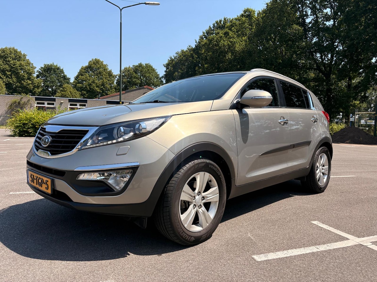 Kia Sportage - 1.6 GDI ISG X-clusive - AutoWereld.nl