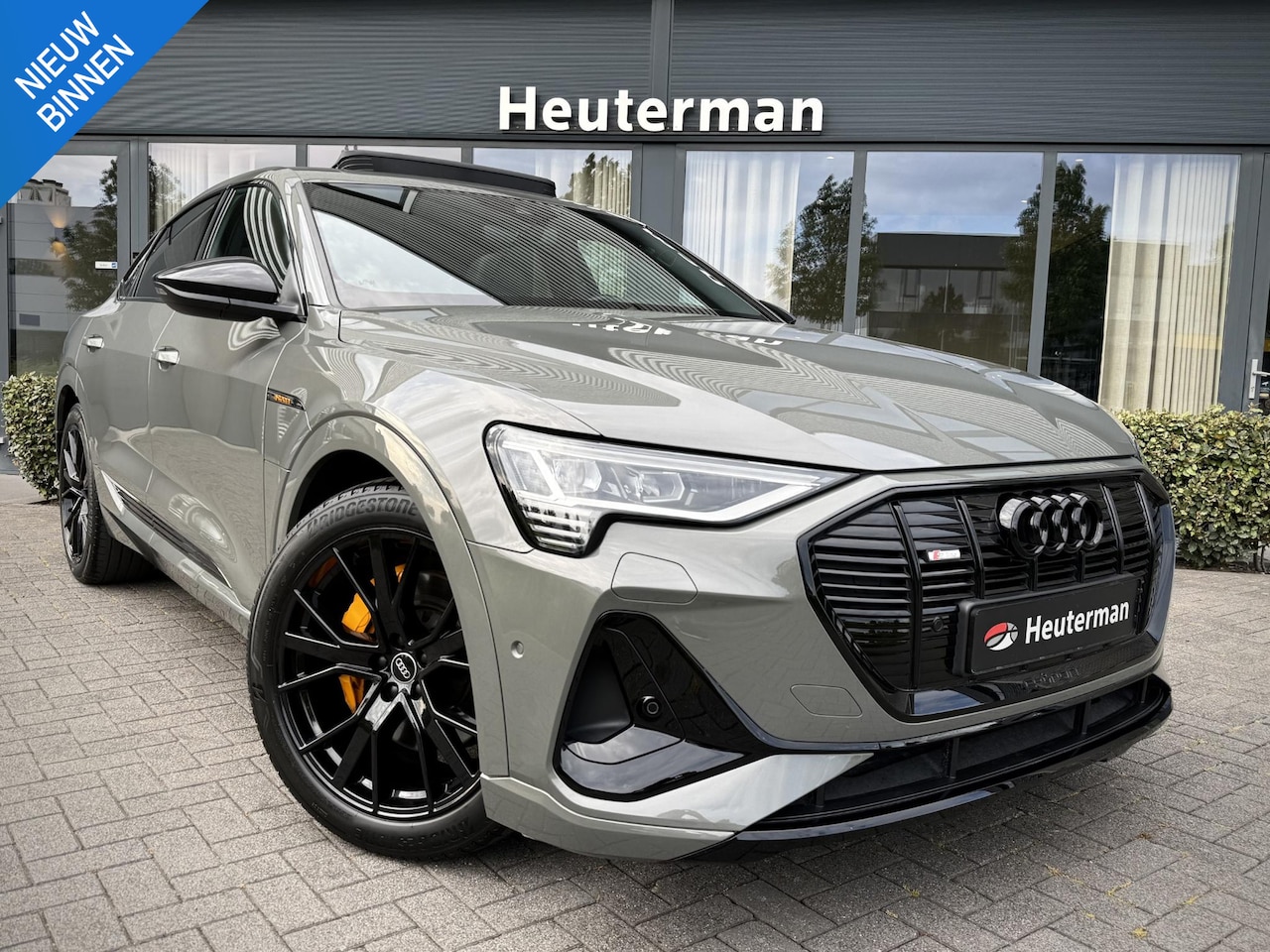 Audi e-tron Sportback - 50 Quattro S Black edition Pano/ Trekhaak/ 95% SOH - AutoWereld.nl