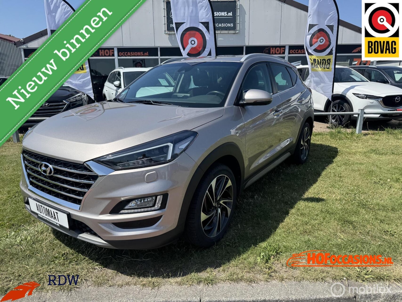 Hyundai Tucson - 1.6 T-GDI 4WD Premium AUTOMAAT/CARPLAY/TREKHAAK - AutoWereld.nl