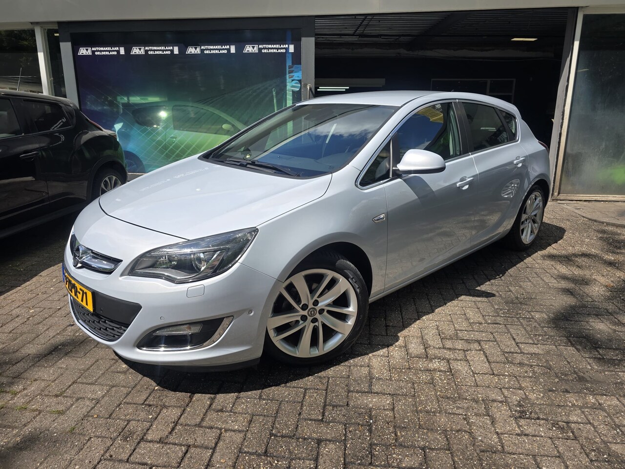 Opel Astra - 1.4 Turbo Sport + |2E EIGENAAR | 12MND GARANTIE | NAVI | CAMERA | NW APK | - AutoWereld.nl