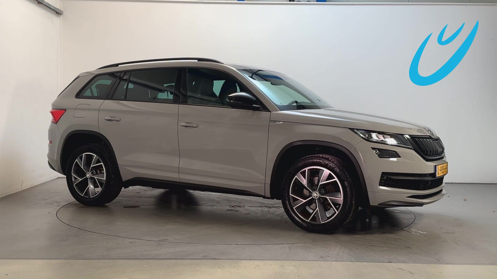 Skoda Kodiaq - 1.5 TSI 150pk Sportline Business 7p. Stoelverwarming Trekhaak Camera Navigatie - AutoWereld.nl