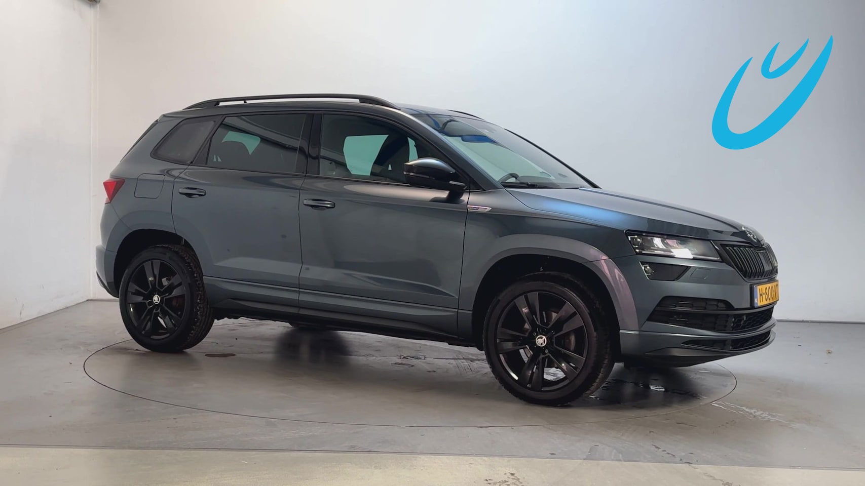 Skoda Karoq - 1.5 TSI DSG ACT Sportline Business Sfeerverlichting Virtual Cockpit Stoelverwarming Naviga - AutoWereld.nl