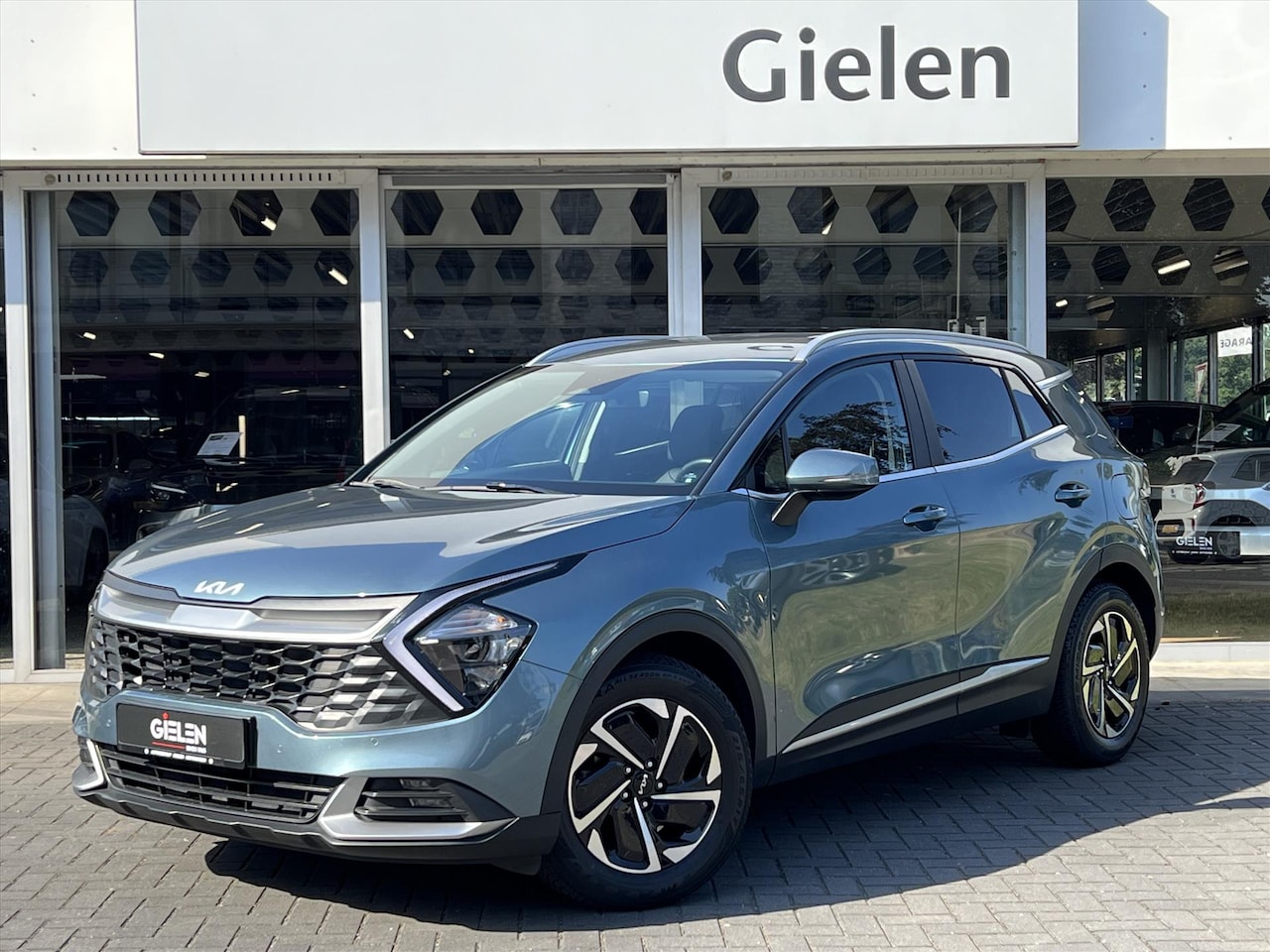Kia Sportage - 1.6 T-GDi MHEV 150PK DynamicLine Automaat | Stoel + Stuurverwarming, Parkeersensoren, Appl - AutoWereld.nl