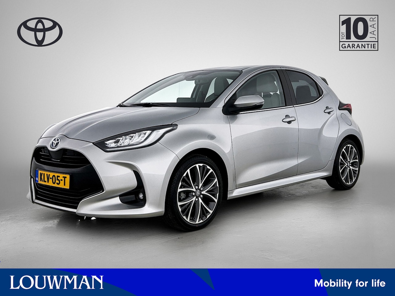 Toyota Yaris - 1.5 Hybrid Style | BTW Voertuig | lichte kleur interieur | Half leder/stof | Stoelverwarmi - AutoWereld.nl
