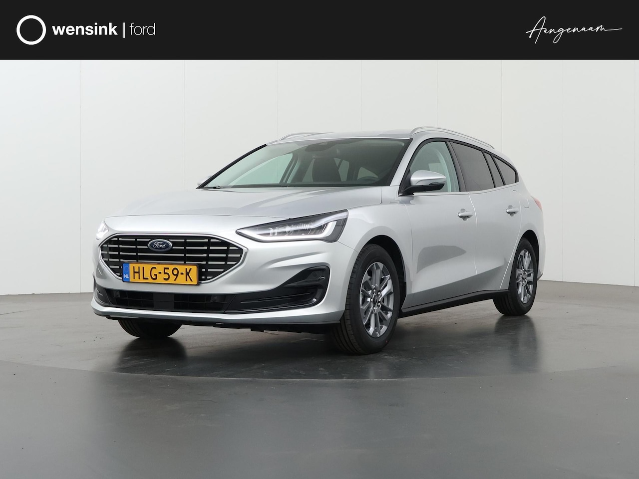Ford Focus Wagon - 1.0 EcoBoost Hybrid Titanium | Winterpakket | Navigatie | Climate Control | Parkeersensore - AutoWereld.nl