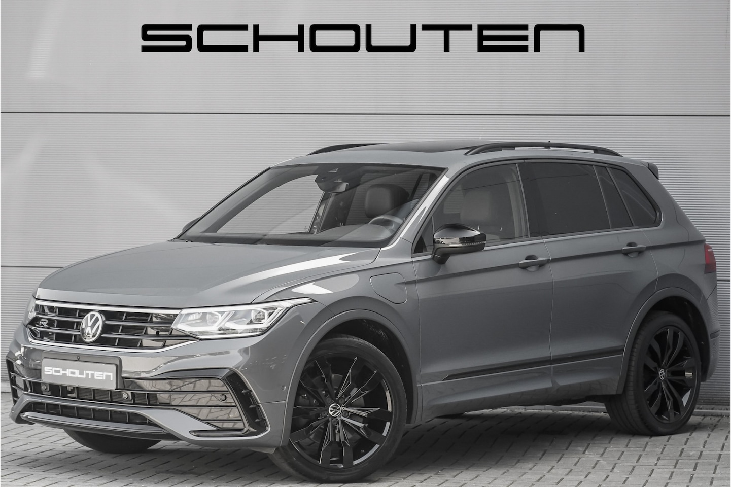 Volkswagen Tiguan - 1.4 TSI eHybrid R-Line Black Pack Pano ACC 360° 20" Suzuka - AutoWereld.nl