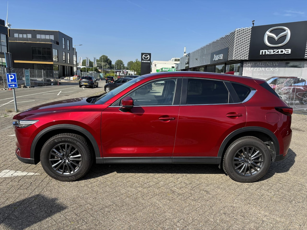 Mazda CX-5 - 2.0 SkyActiv-G 165 Business Comfort 2.0 SkyActiv-G 165 Business Comfort , Leder, Navi, Bose, Cruise, PDC, LMV 17 Inch, All Sea - AutoWereld.nl
