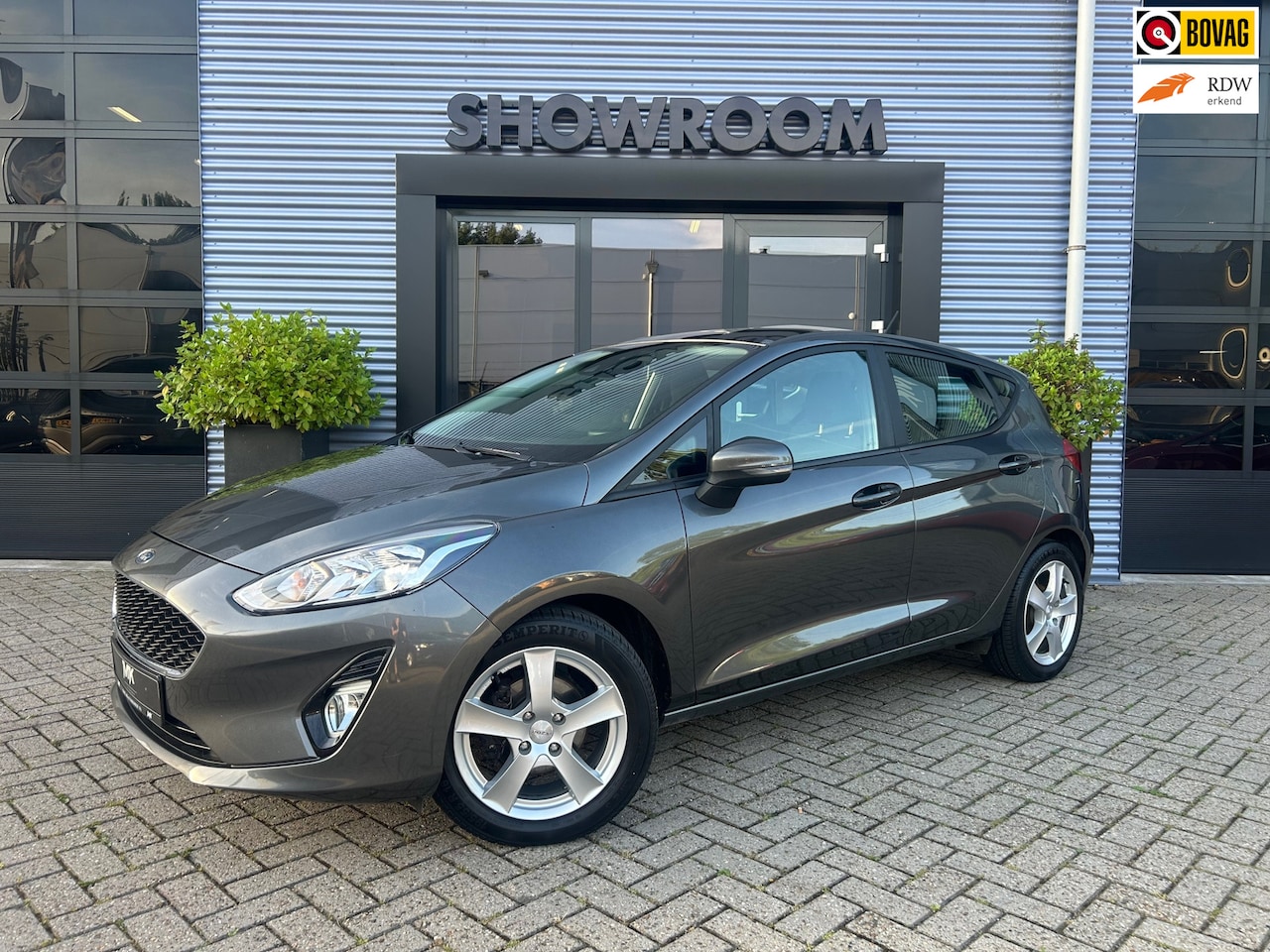 Ford Fiesta - 1.0 EcoBoost Titanium AUTOMAAT|APPLECARPLAY|16inch-LM VELGEN|CRUISE|STOELVERWARMING|PDC|NA - AutoWereld.nl