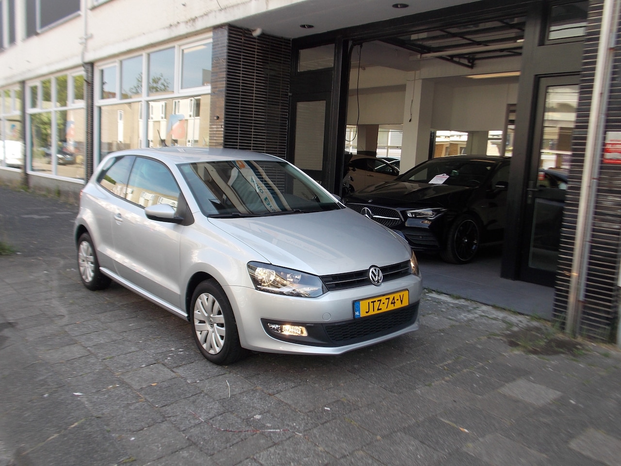 Volkswagen Polo - 1.2-12V BlueMotion Comfortline UNIEK 24 DKM!! NAVI CLIMA CRUISE PDC - AutoWereld.nl