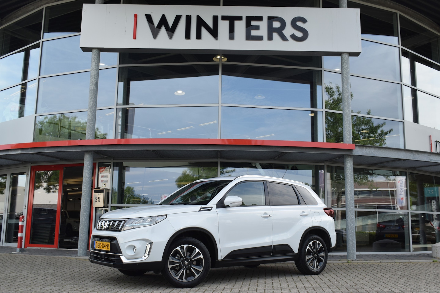 Suzuki Vitara - 1.5 Hybrid Style Automaat | Trekhaak | Navigatie | Ledere bekleding | - AutoWereld.nl