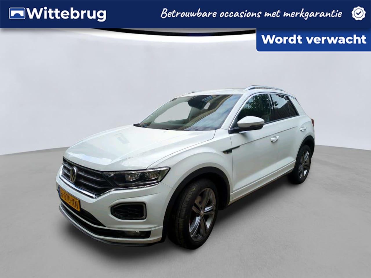 Volkswagen T-Roc - 1.5 TSI 150pk Sport Business R DSG Automaat / Clima / Camera / LM 18'' / LED / App connect - AutoWereld.nl