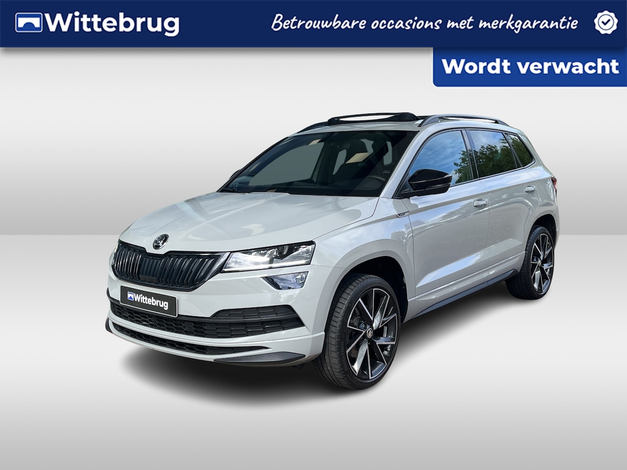 Skoda Karoq - 1.5 TSI ACT Sportline Business / Panorama dak / Carplay / Stoelverwarming voor en achter / - AutoWereld.nl