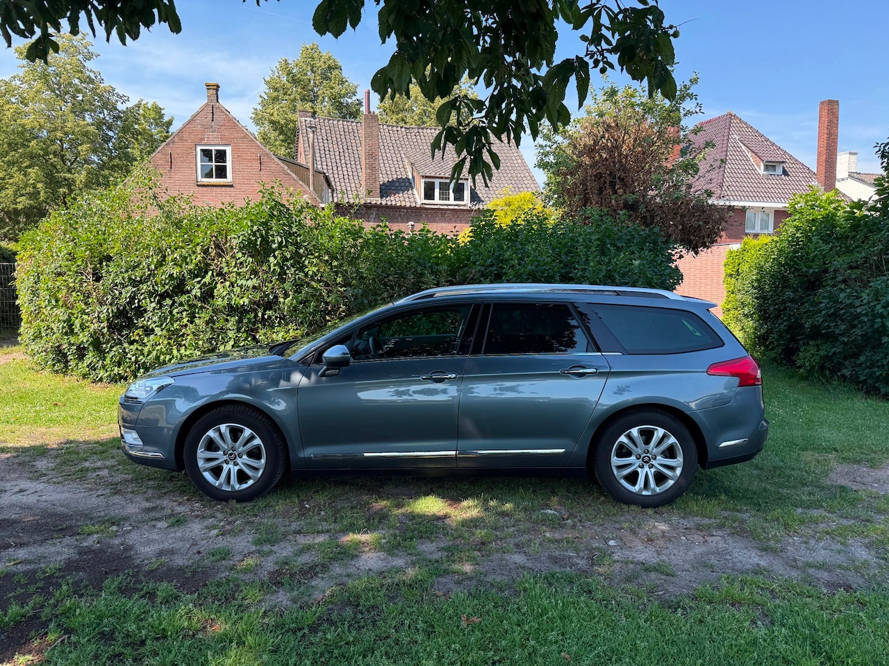 Citroën C5 Tourer - 2.0 HDiF Exclusive AUTOMAAT EERSTE EIGENAAR DEALER ONDERHOUDEN WEINIG KM - AutoWereld.nl