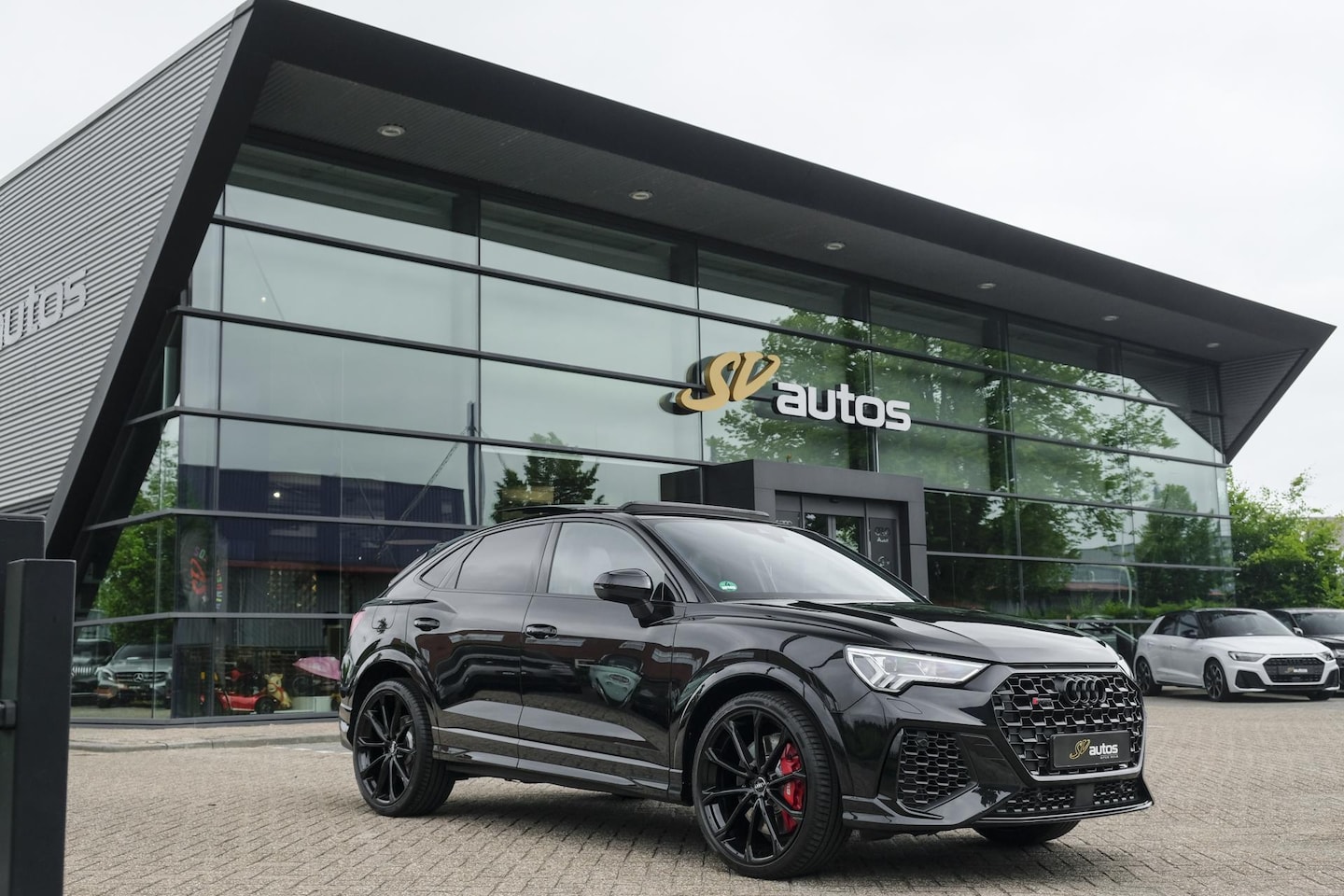 Audi RSQ3 Sportback - TFSI 400pk Panoramadak Sonos Trekhaak 21" LMV BOMVOL Rode stiksels Carbon - AutoWereld.nl