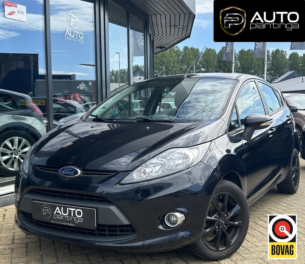 Ford Fiesta - 1.25 Limited | Airco | Stoelverwarming | Lichtmetalen Velgen | 5 Deurs | 2 Sleutels | - AutoWereld.nl