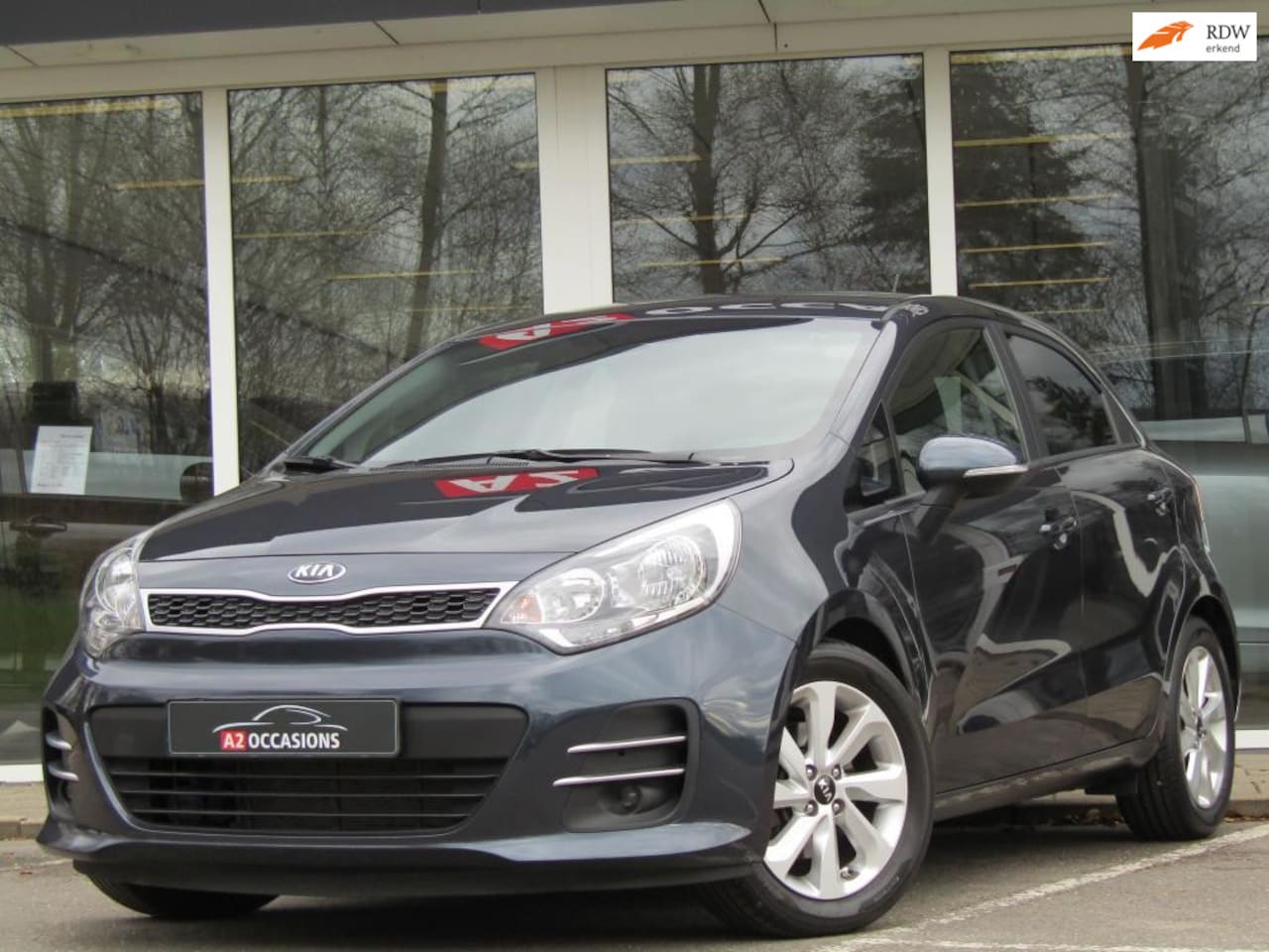 Kia Rio - 1.2 CVVT Clima/Cruise/Bluetooth/PDC/ - AutoWereld.nl