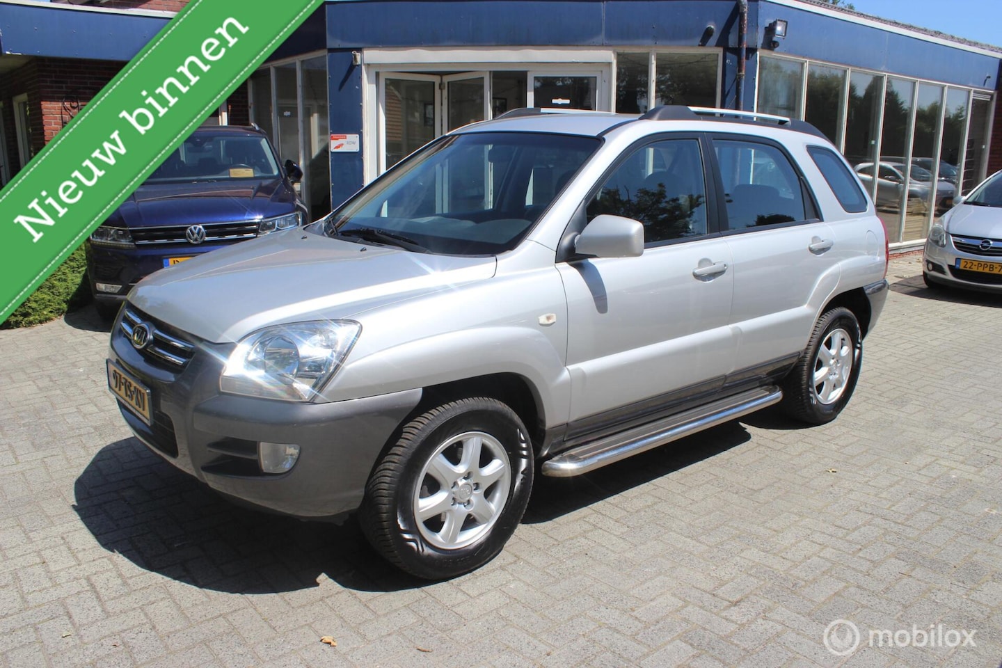 Kia Sportage - 2.0 CVVT Executive 2.0 CVVT Executive - AutoWereld.nl
