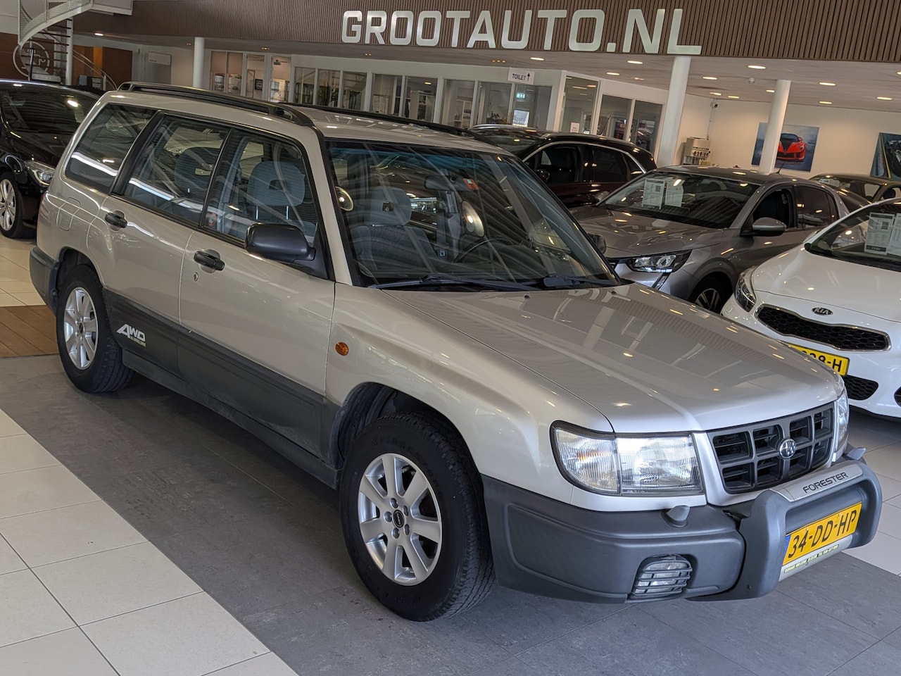 Subaru Forester - 2.0 AWD basis Airco, Stuurbekrachtiging - AutoWereld.nl