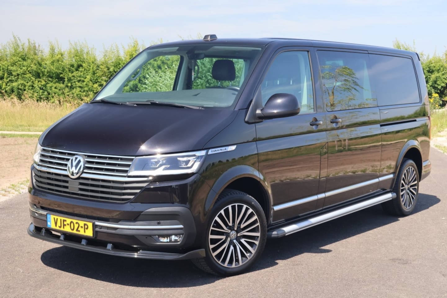 Volkswagen Transporter Caravelle - 2.0 TDI 150pk Lang DC DSG | Trekhaak | Leder | ACC - AutoWereld.nl