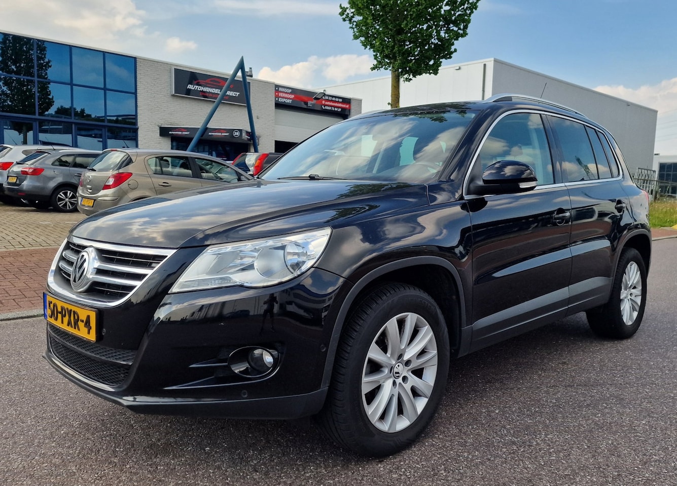 Volkswagen Tiguan - 1.4 TSI Sport&Style NAVI PSENSOR CRUISE 2 X SLEUTELS TREKHAAK - AutoWereld.nl