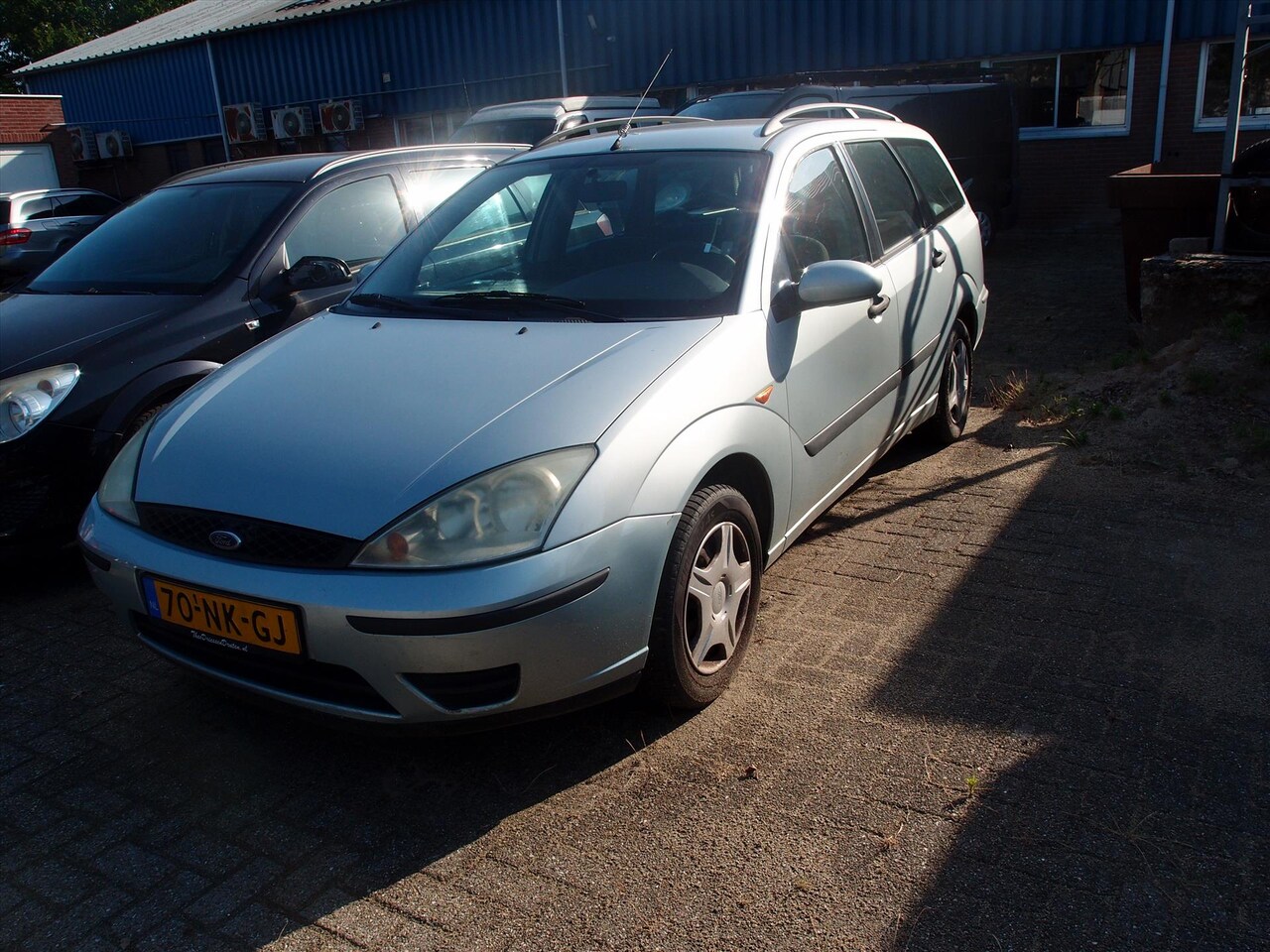 Ford Focus Wagon - 1.4 I Ambiente - AutoWereld.nl