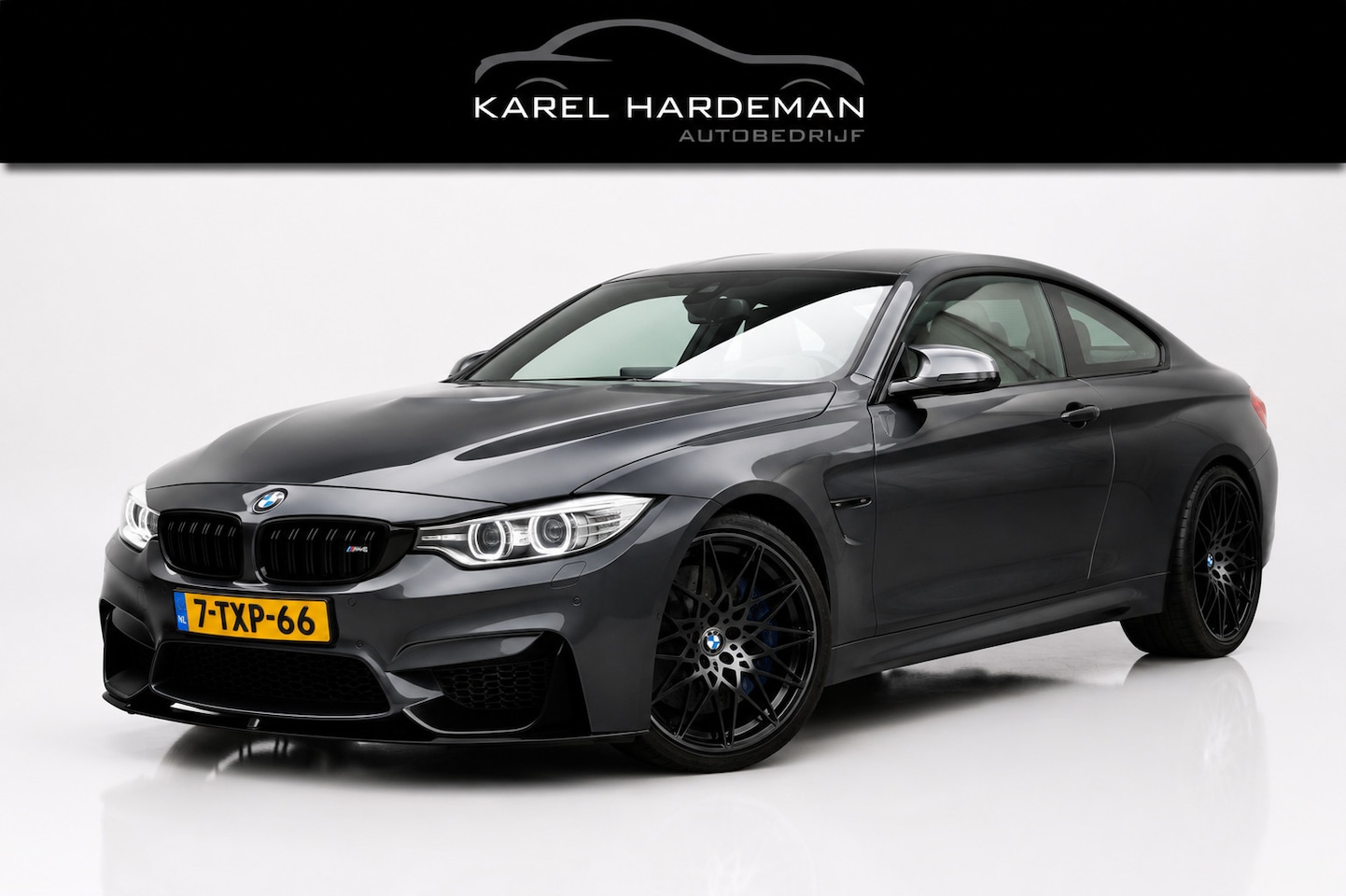 BMW 4-serie Coupé - M4 | HUD | H&K | Side View - AutoWereld.nl