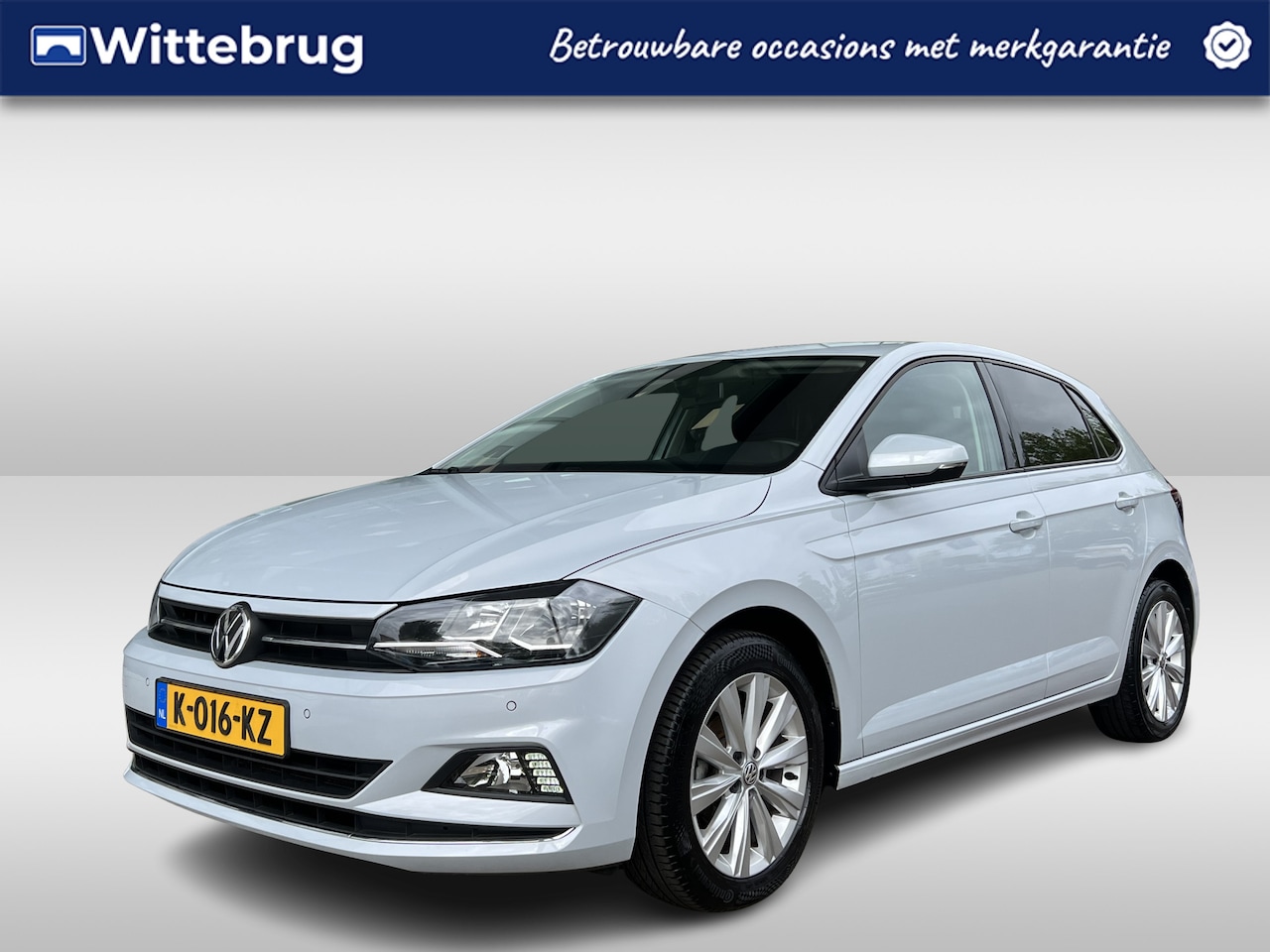 Volkswagen Polo - 1.0 TSI 95pk Highline Executive / Navigatie / Carplay / Parkeer sensoren V+A / Carplay / 1 - AutoWereld.nl