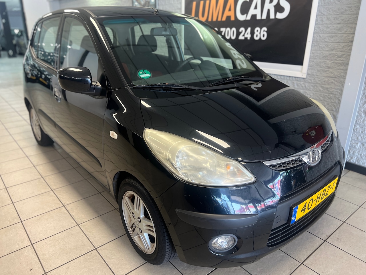 Hyundai i10 - 1.1 i-Catcher| Airco | 5-deurs | LMV | Elektr. | - AutoWereld.nl