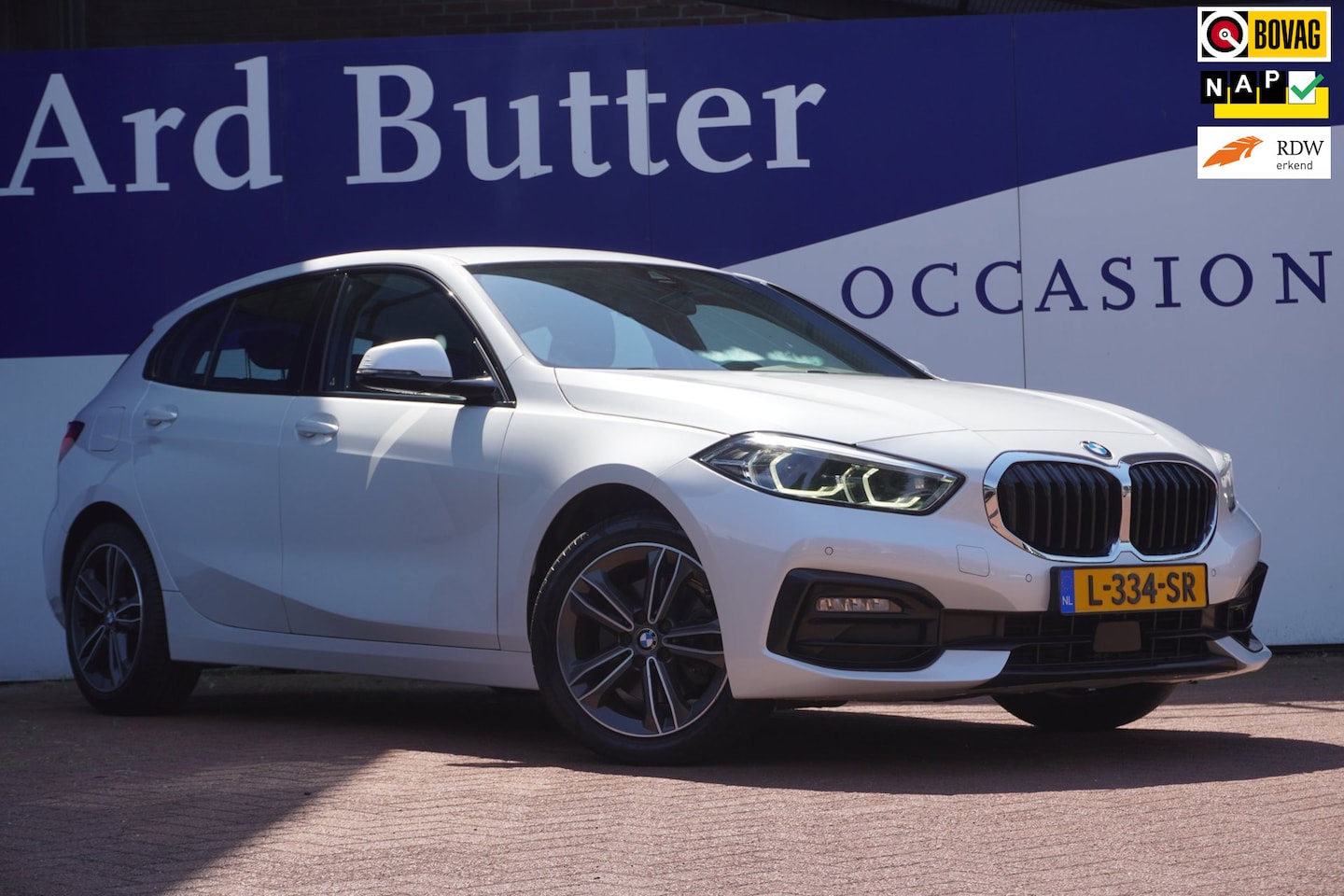 BMW 1-serie - 118i Business Edition+Sportline+Led+leder+stoel-verw+Full-navigatie+Parel-White = TOP AANB - AutoWereld.nl