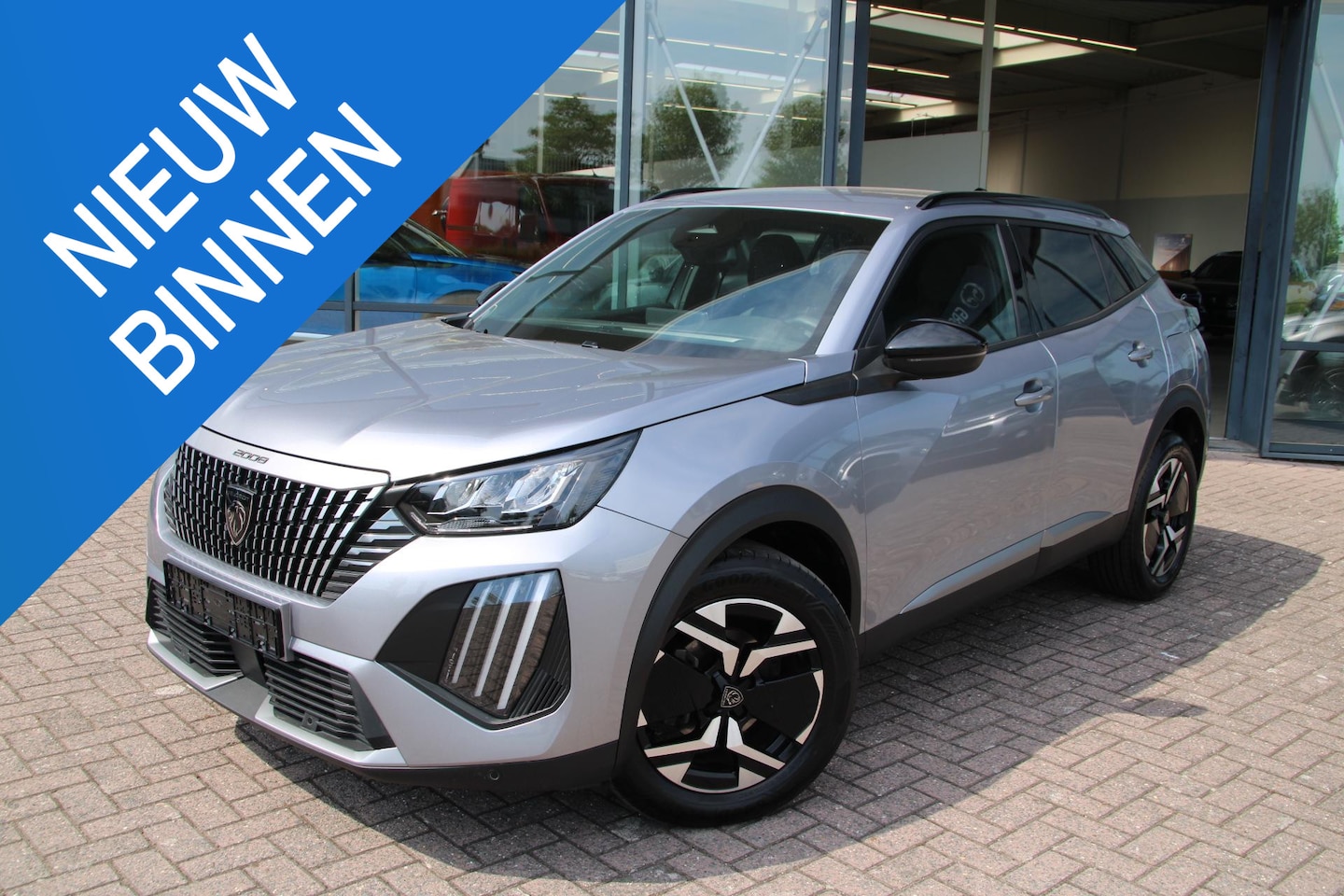 Peugeot 2008 - 1.2 PureTech 100 Allure Airco Carplay Rondom sensoren 17539km Nieuwstaat - AutoWereld.nl