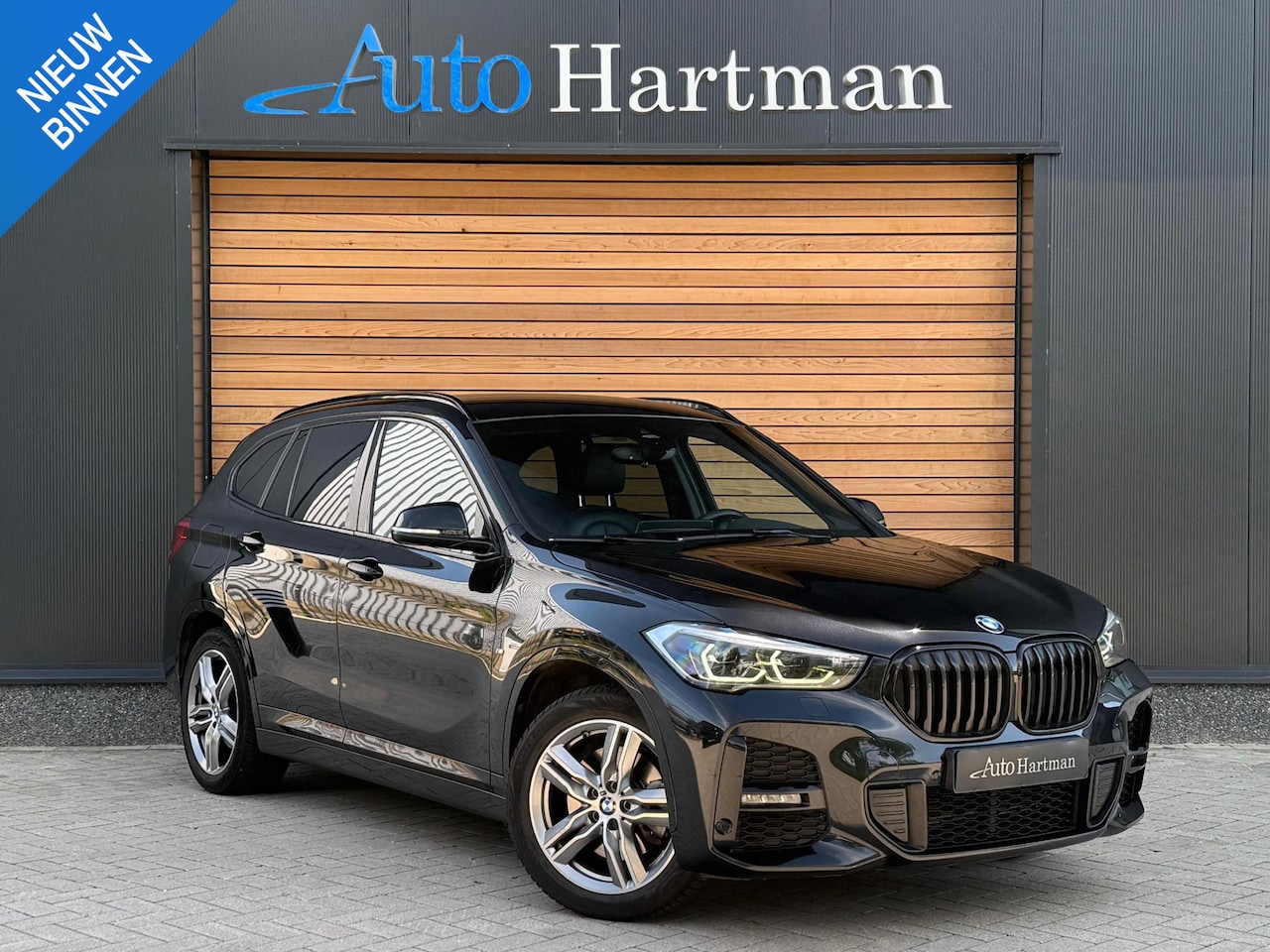 BMW X1 - xDrive25e High Executive HEAD-UP|H&K|KEYLESS|TREKHAAK - AutoWereld.nl