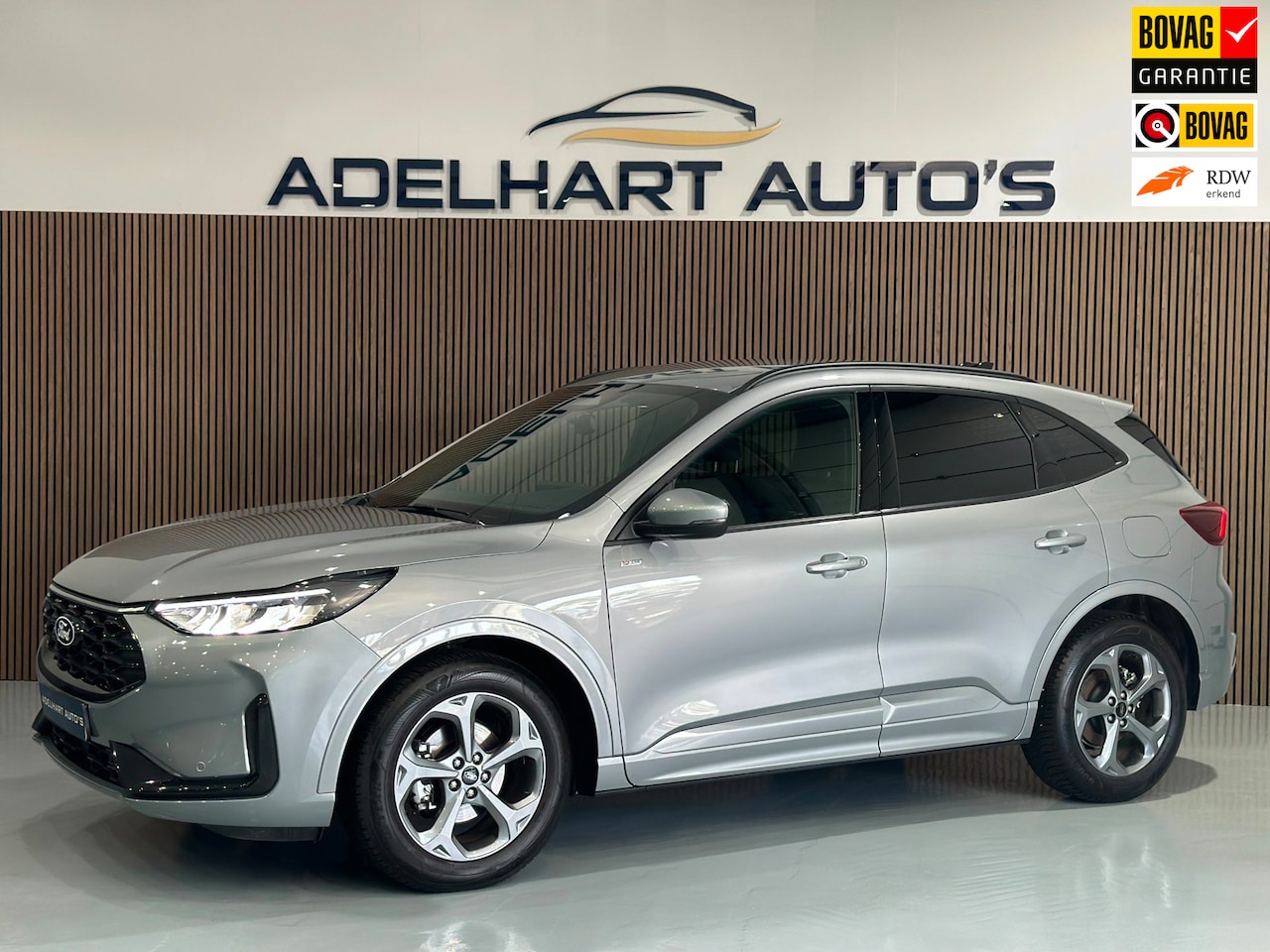 Ford Kuga - 2.5 FHEV ST-Line X 192 PK Automaat / Navigatie full map / Camera / Cruise control / Etc.. - AutoWereld.nl