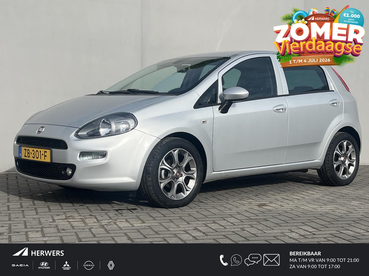 Fiat Punto Evo - 0.9 TwinAir Sempre / Trekhaak (1.000KG) / Navigatie / Bluetooth / Airco / 16'' Lichtmetale - AutoWereld.nl