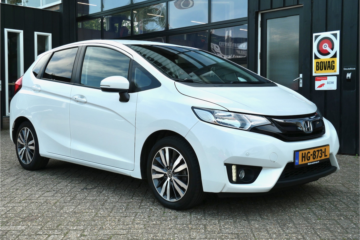 Honda Jazz - 1.3 i-VTEC Elegance Automaat | 1e Eigenaar | NL-Auto | Clima | Cruise - AutoWereld.nl