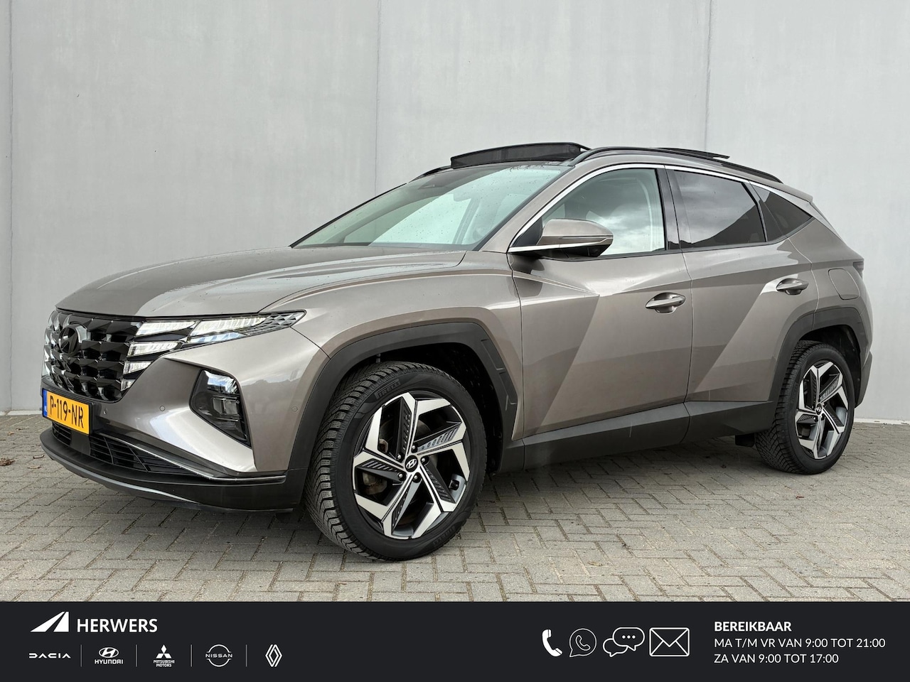 Hyundai Tucson - 1.6 T-GDI HEV Premium Sky / NL auto / Schuif/open dak / Stoel-/stuurverwarming / Navigatie - AutoWereld.nl