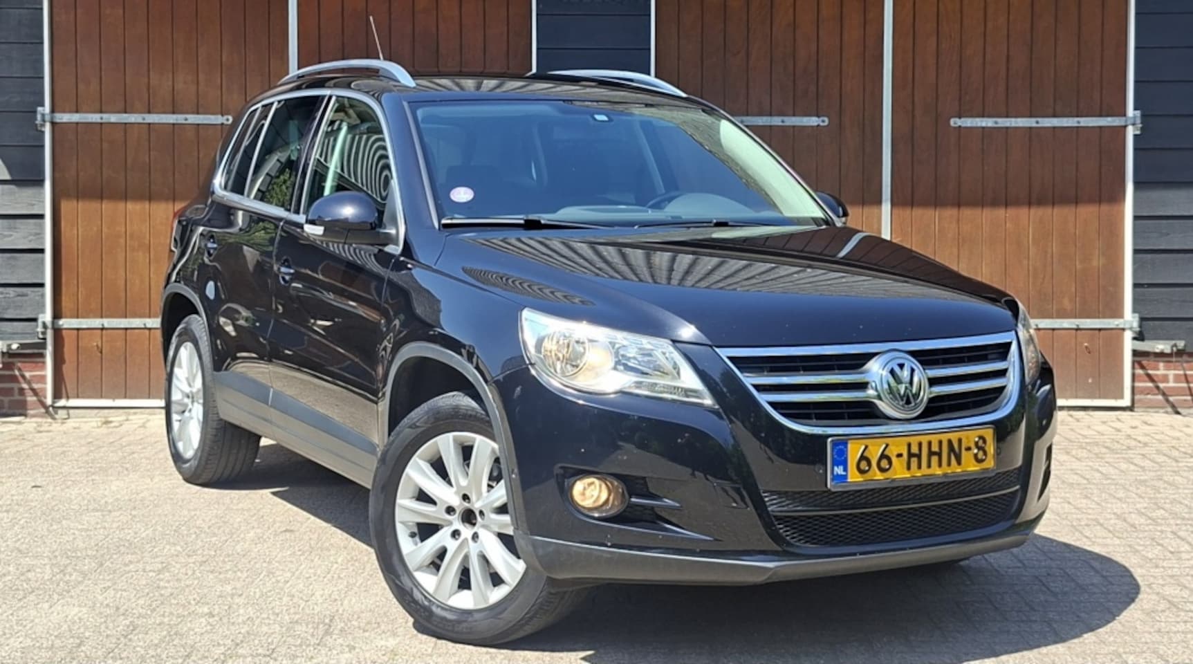 Volkswagen Tiguan - 1.4 TSI Sport&Style | Onderhoudsboekjes | NAP | Cruise control | - AutoWereld.nl