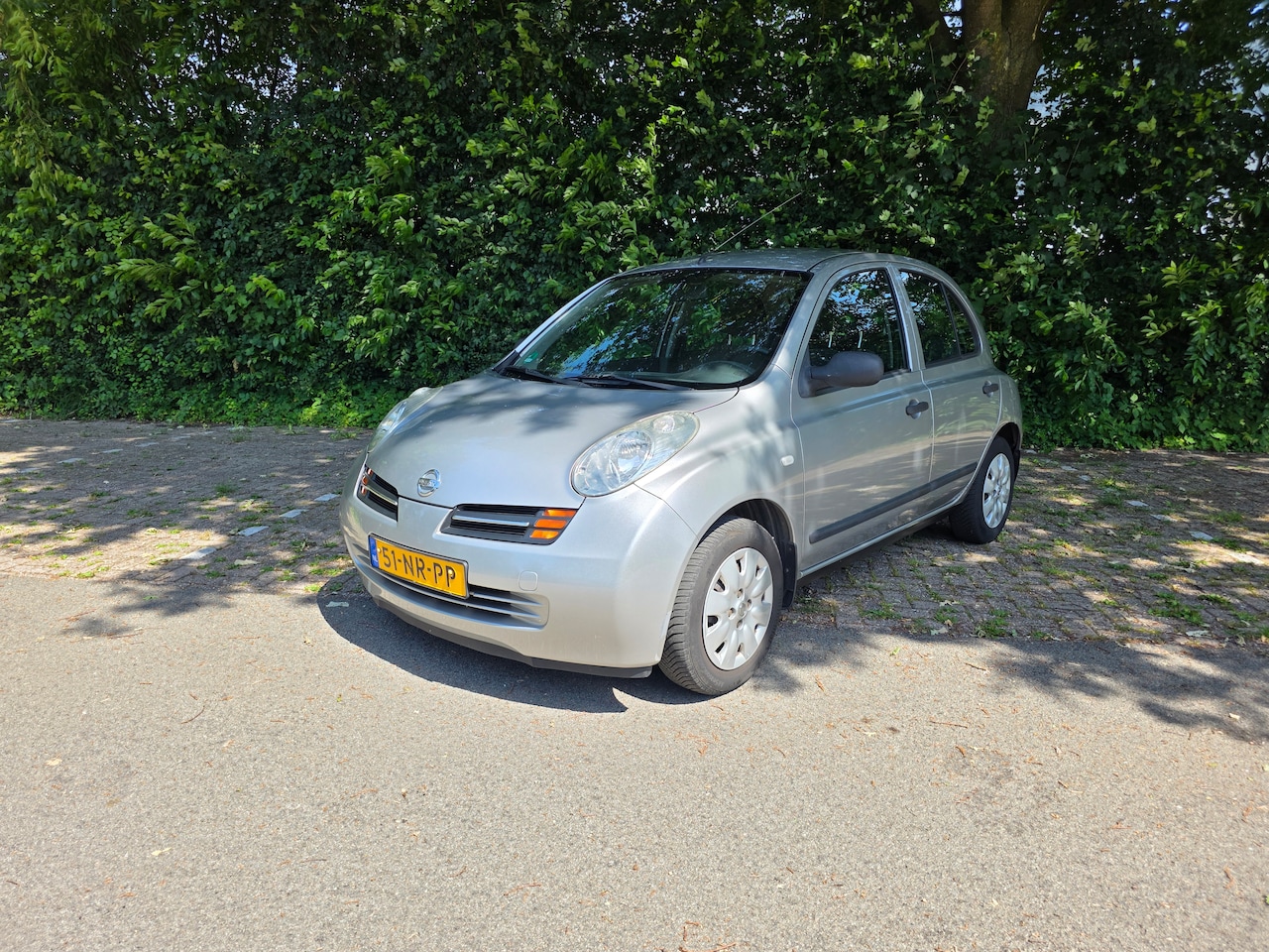 Nissan Micra - 1.2 Tekna - AutoWereld.nl