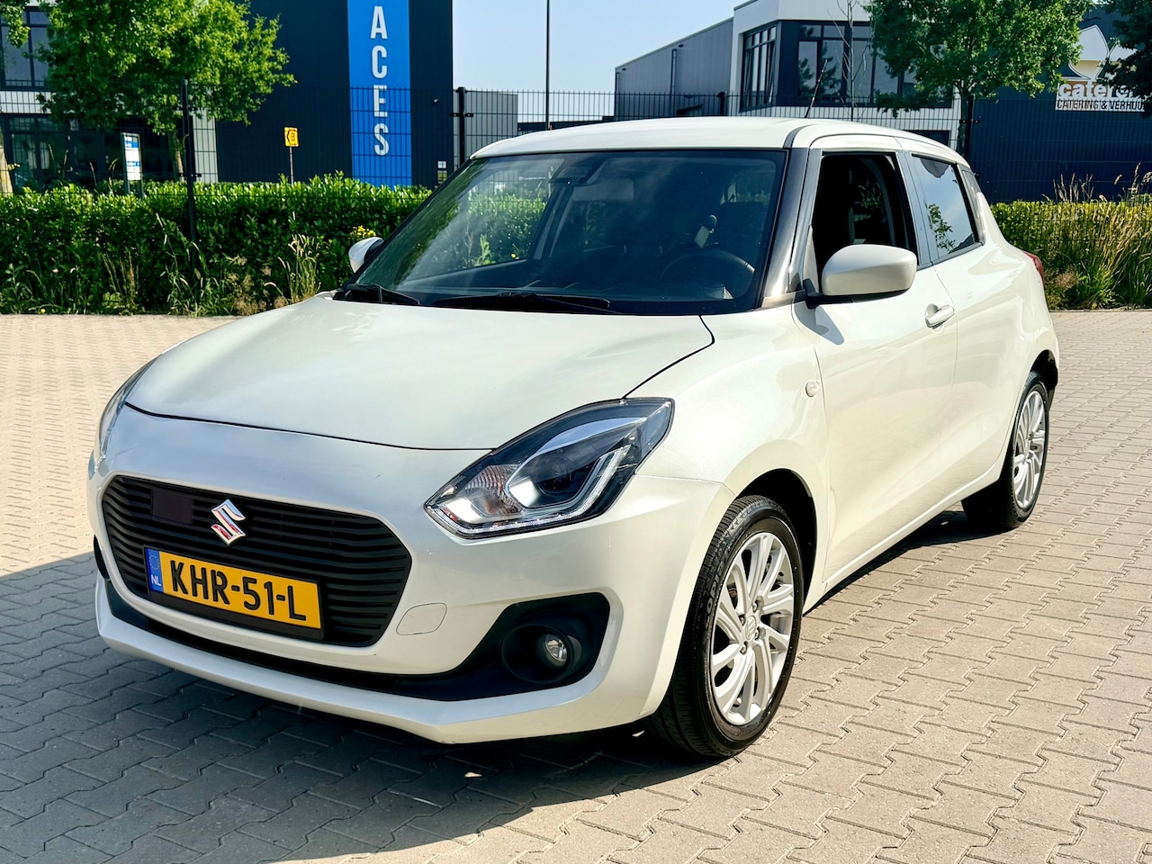 Suzuki Swift - 1.2 Select Smart Hybrid Parelmoer Wit - AutoWereld.nl