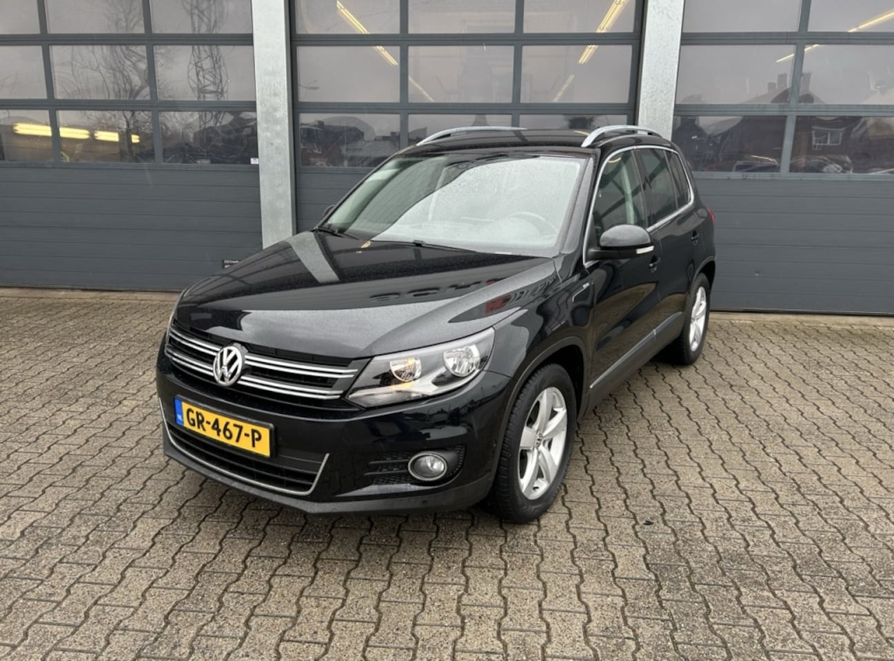 Volkswagen Tiguan - 1.4 TSI 122pk BlueMotion Technology Sport & St - AutoWereld.nl