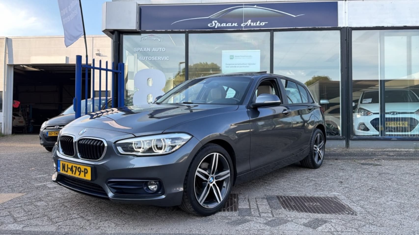 BMW 1-serie - 118i Cent High Exe - AutoWereld.nl