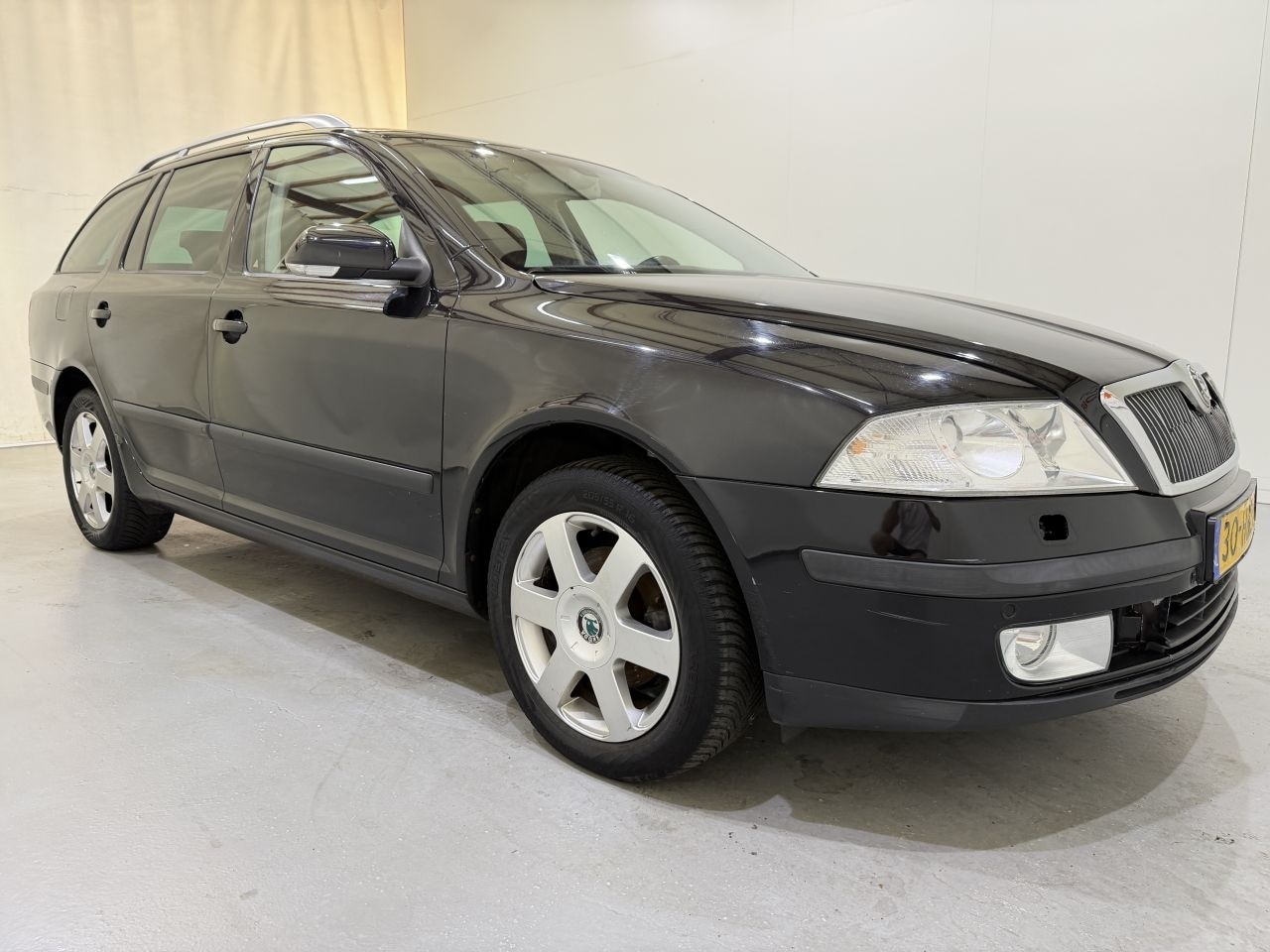 Skoda Octavia Combi - 1.6 FSI Elegance Navi/Clima - AutoWereld.nl