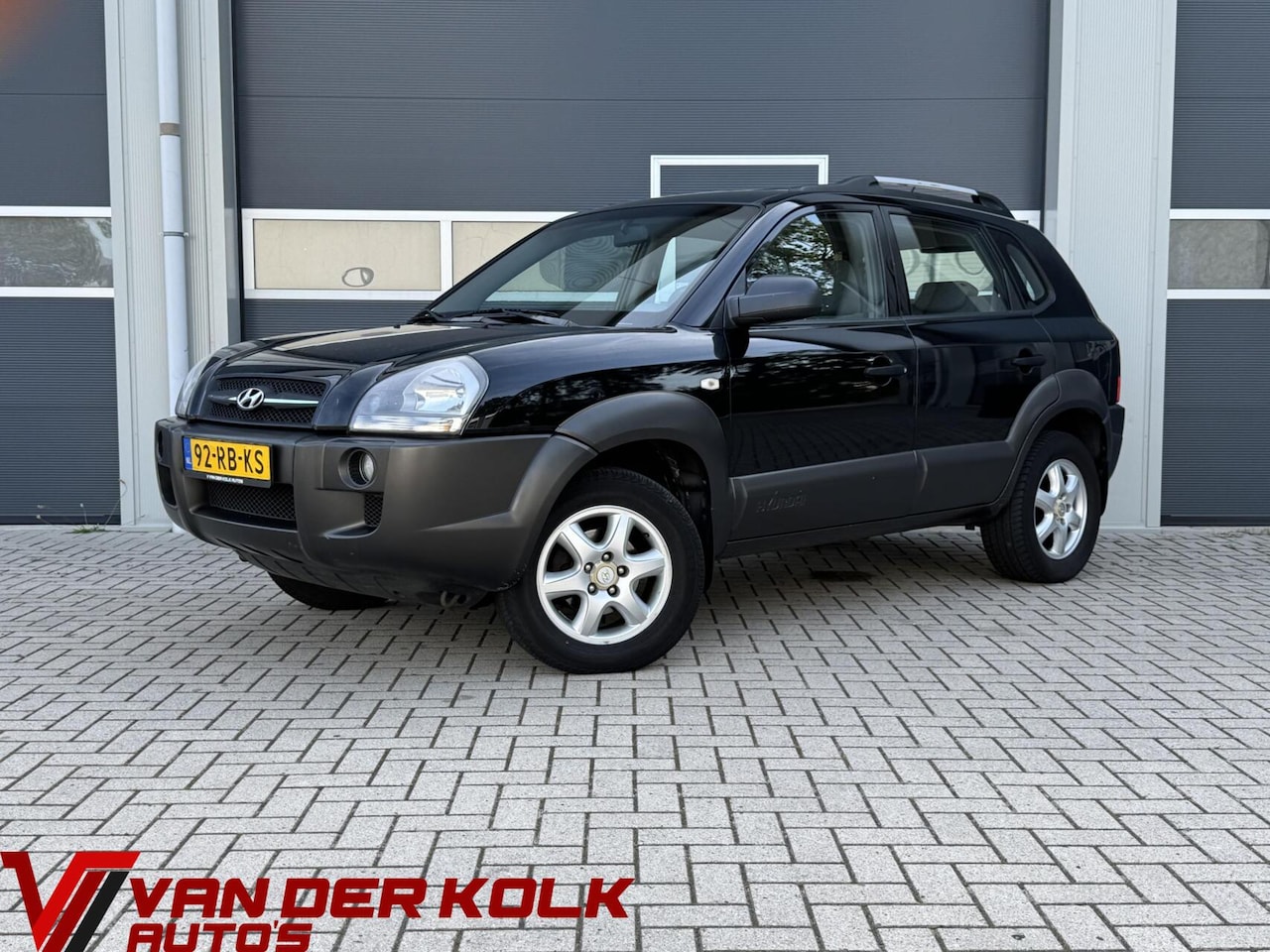 Hyundai Tucson - 2.0i Dynamic | Airco | Trekhaak | Lichtmetaal - AutoWereld.nl