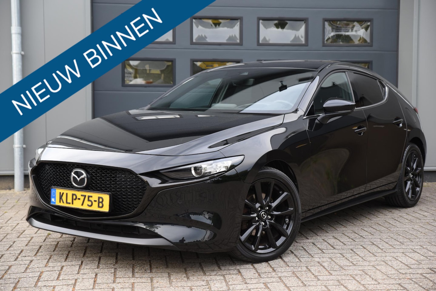 Mazda 3 Sport - 2.0 e-SkyActiv-G M Hybrid 150 Sportive Homura - AutoWereld.nl