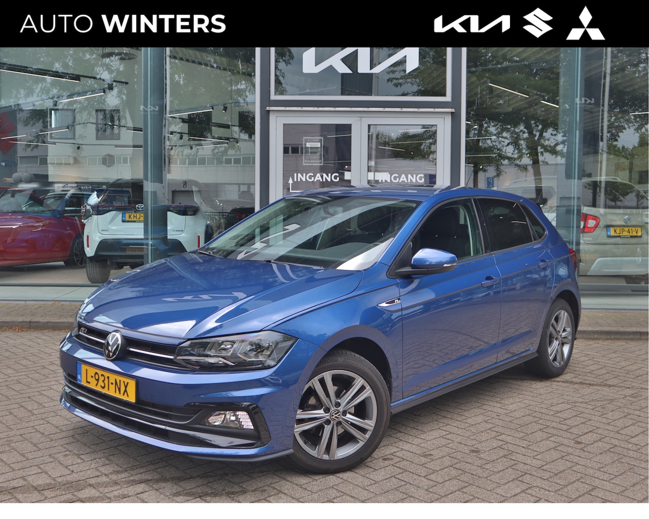 Volkswagen Polo - 1.0 TSI R-Line Edition | Airco | Navigatie | 16" LMV | Adaptieve Cruise Control | - AutoWereld.nl