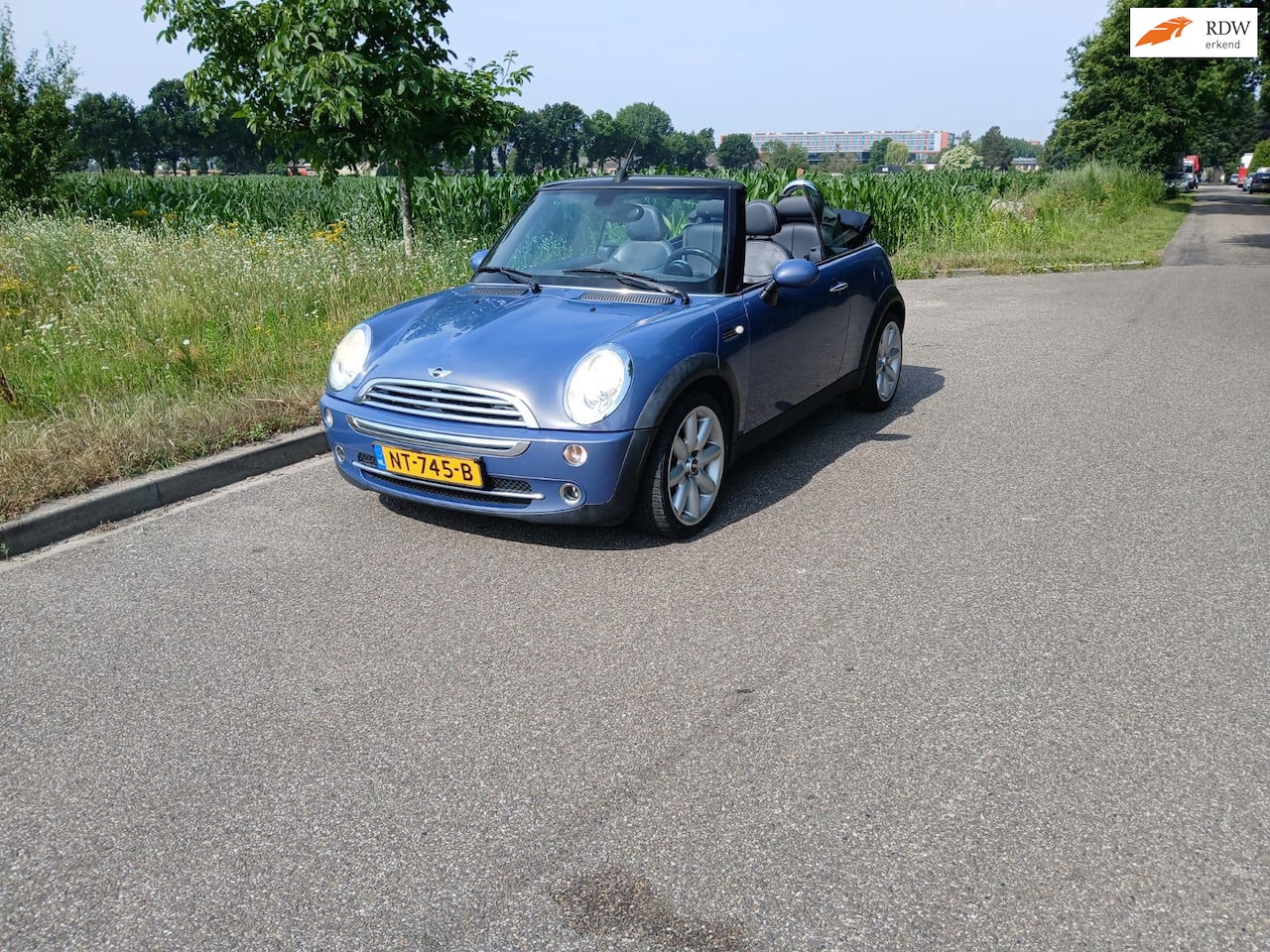 MINI Cabrio - 1.6 Cooper LEER/airco - AutoWereld.nl