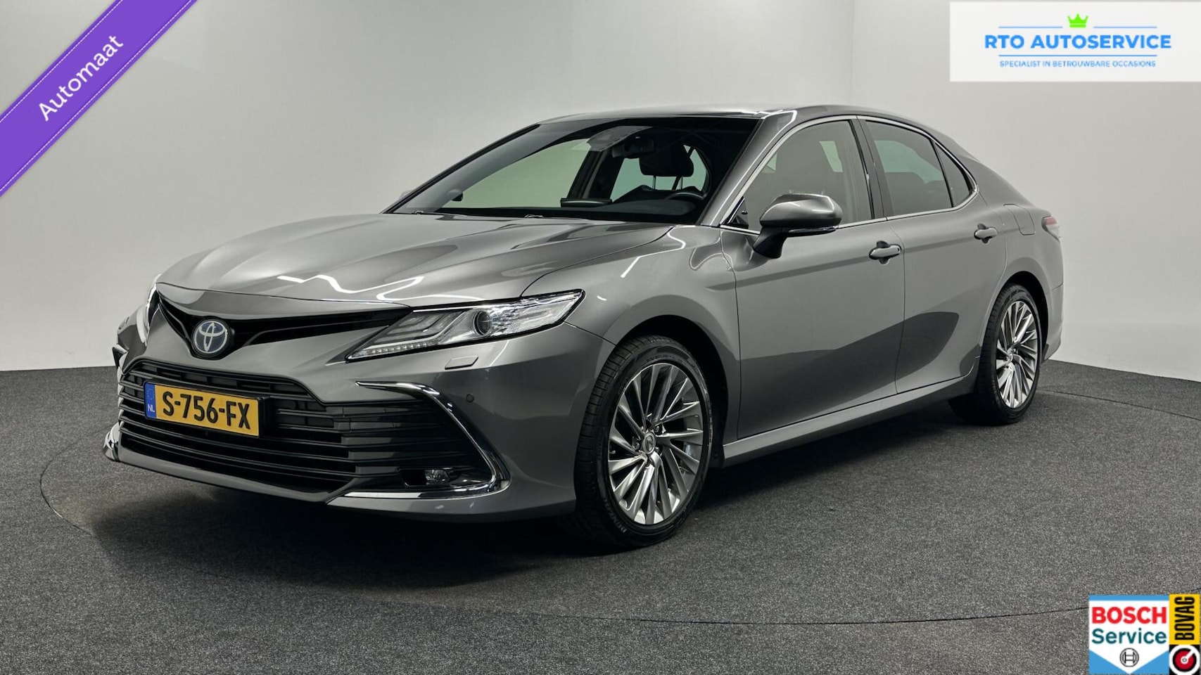 Toyota Camry - 2.5 Hybrid Business Intro CAMERA CARPLAY NAVI LEER ECC ADAPTIEF CRUISE. - AutoWereld.nl