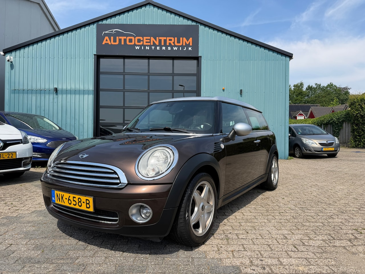 MINI Clubman - 1.6 Cooper Panoramadak Airco NweApk - AutoWereld.nl
